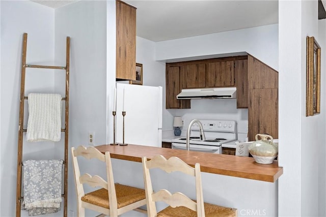 kitchen featuring white appliances