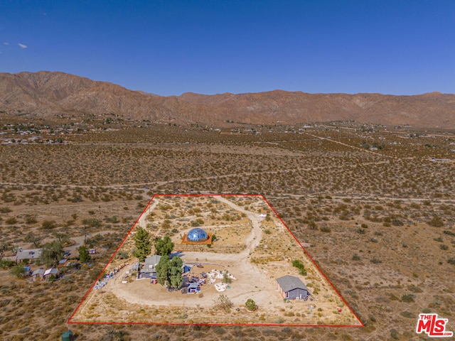 aerial view featuring a mountain view