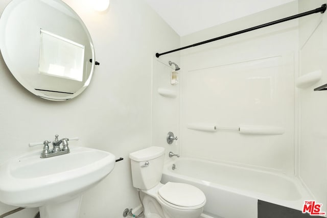 full bathroom featuring shower / bathing tub combination, toilet, and sink