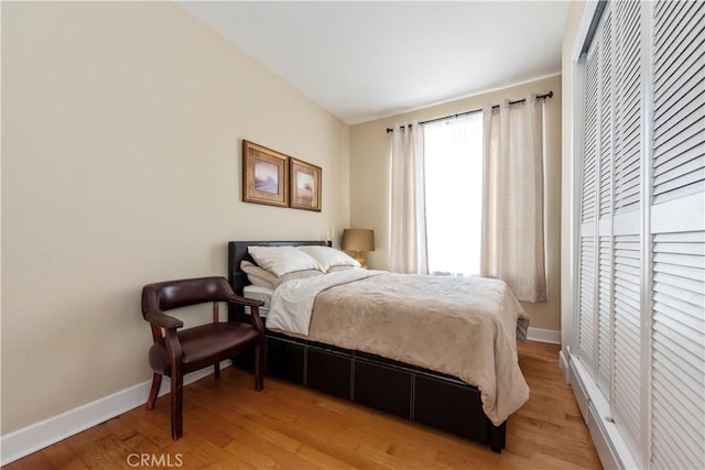 bedroom with wood-type flooring