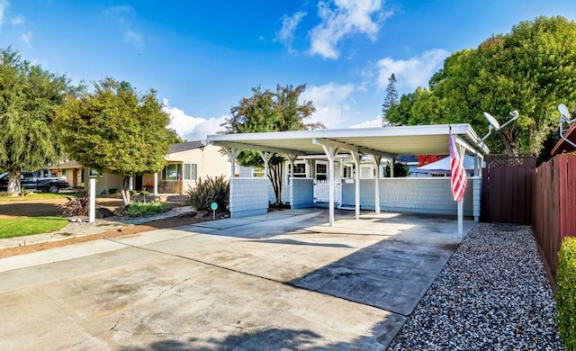 view of front facade with a carport