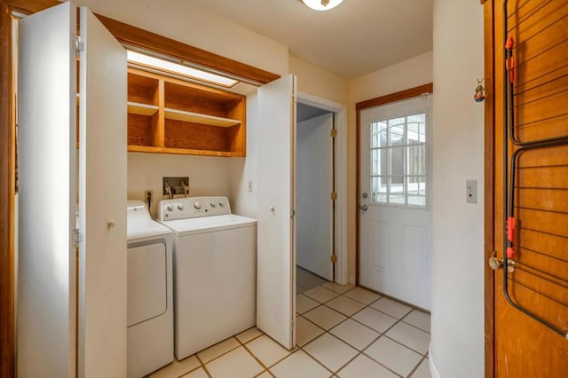 washroom featuring washer and clothes dryer