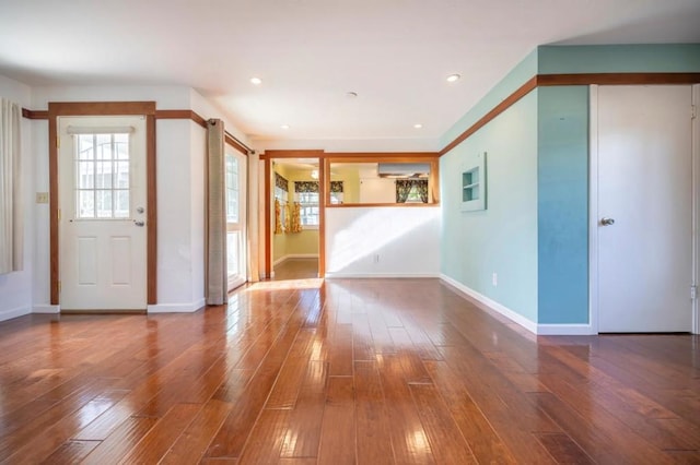 unfurnished room featuring wood-type flooring