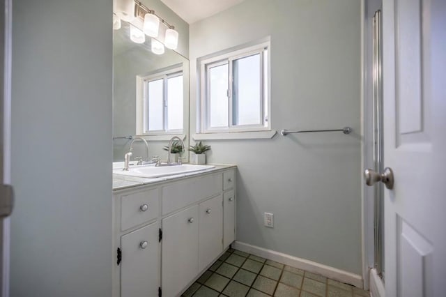 bathroom featuring vanity and tile patterned floors