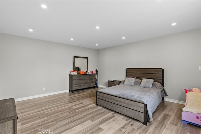 bedroom featuring light hardwood / wood-style floors