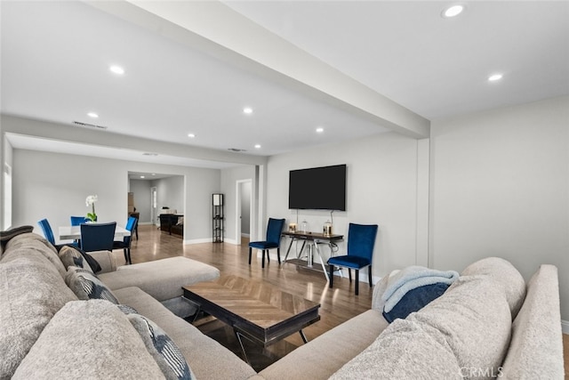 living room featuring parquet flooring