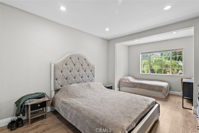 bedroom featuring hardwood / wood-style floors