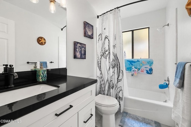 full bathroom featuring vanity, shower / bath combination with curtain, and toilet