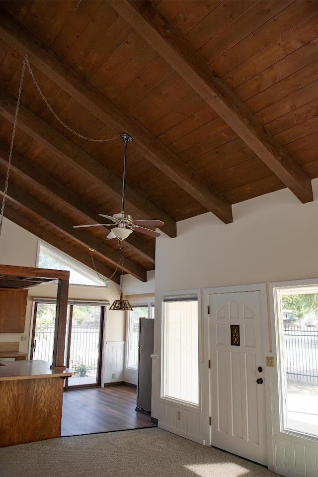 foyer with wood ceiling, vaulted ceiling with beams, and dark wood-type flooring