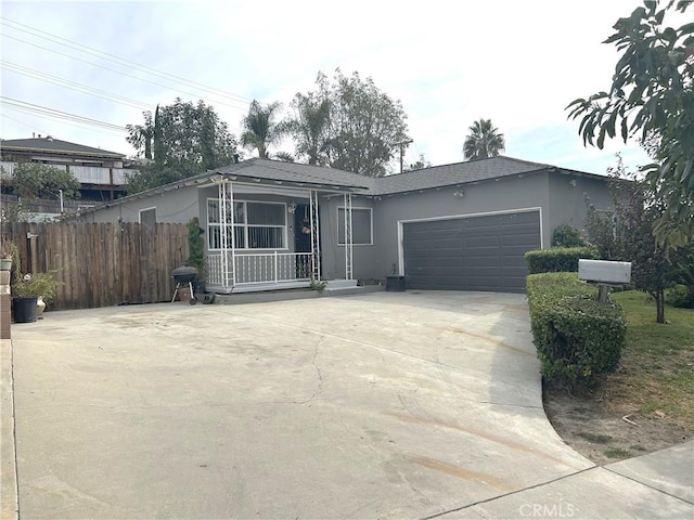 ranch-style home with a garage