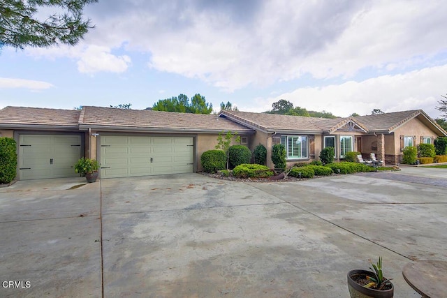 single story home featuring a garage