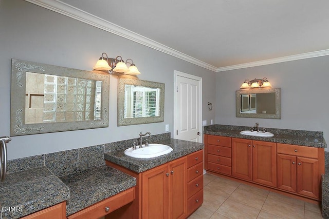 bathroom featuring tile patterned floors, vanity, and ornamental molding