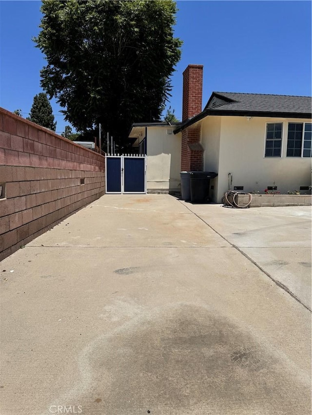 view of home's exterior featuring a patio area