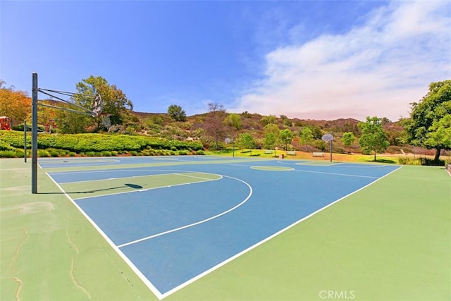 view of sport court featuring community basketball court