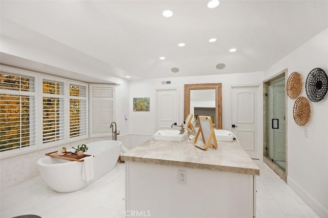 full bath with recessed lighting, vanity, visible vents, a freestanding bath, and a shower stall