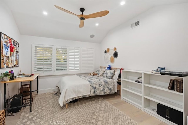 bedroom with lofted ceiling, ceiling fan, recessed lighting, wood finished floors, and visible vents