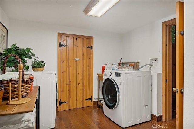 washroom featuring washer / dryer and dark hardwood / wood-style flooring