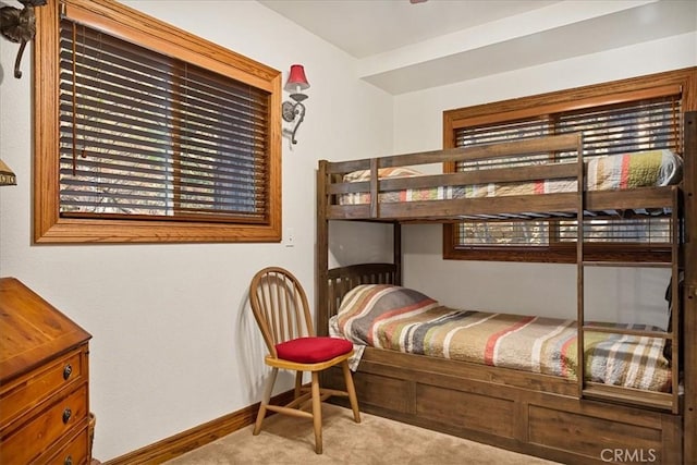 bedroom with light colored carpet