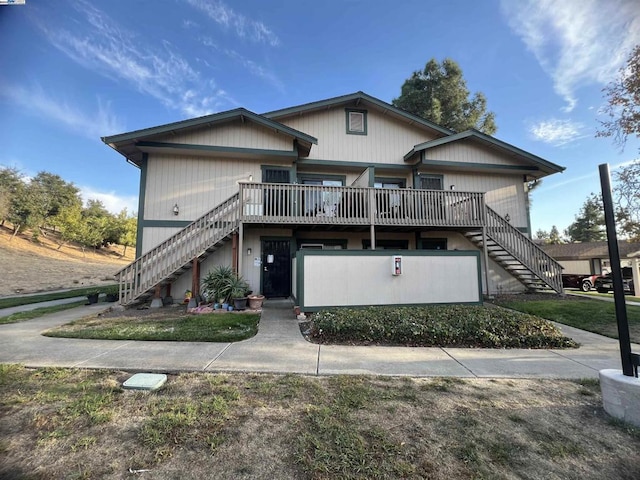 view of front of property with a deck