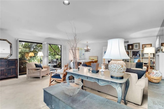 living room with an inviting chandelier