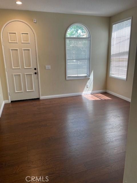 1467 Avila Dr, Perris, CA 92517 - entrance foyer with dark wood finished floors, healthy amount of natural light, and recessed lighting