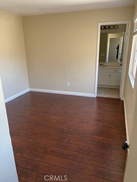 1467 Avila Dr, Perris, CA 92517 - unfurnished room featuring dark wood-style flooring