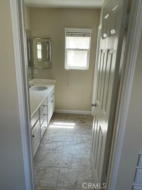 1467 Avila Dr, Perris, CA 92517 - bathroom featuring vanity and baseboards