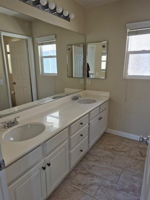 1467 Avila Dr, Perris, CA 92517 - bathroom with double vanity and marble look tiles