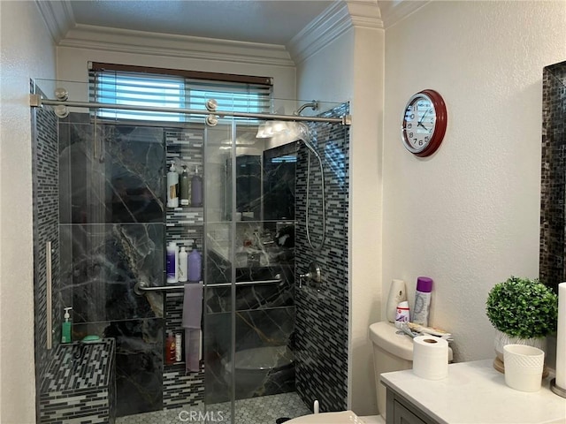 bathroom featuring crown molding, a shower with shower door, and toilet