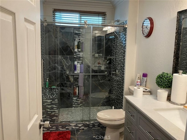 bathroom featuring toilet, an enclosed shower, crown molding, and vanity