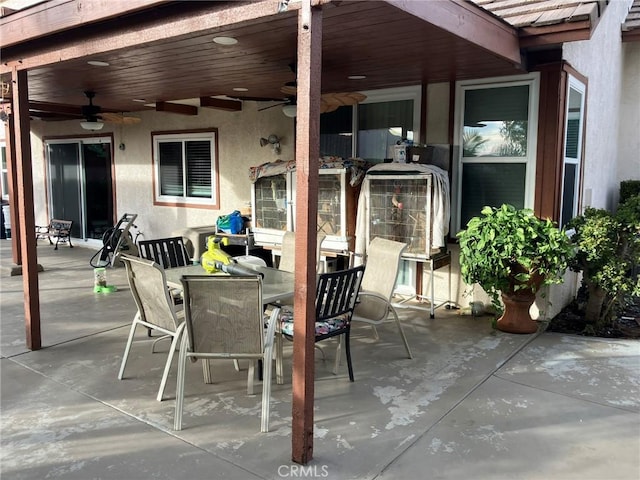 view of patio featuring ceiling fan