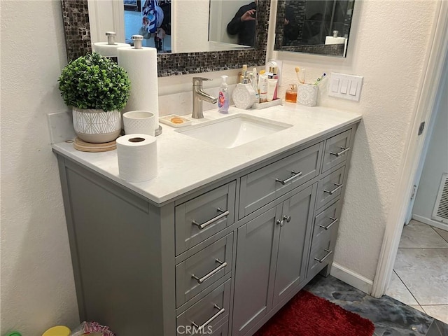 bathroom featuring vanity and tile patterned floors