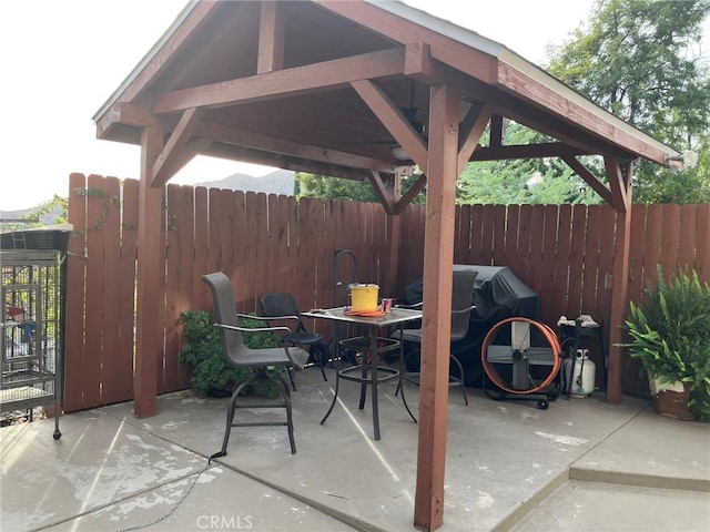 view of patio with a gazebo and grilling area