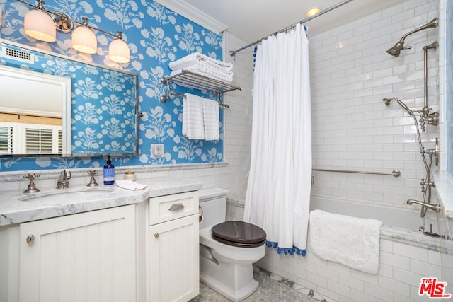 full bathroom featuring shower / bath combo, vanity, and toilet