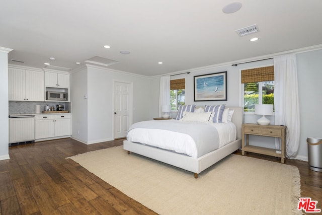 bedroom featuring ornamental molding and dark wood-type flooring