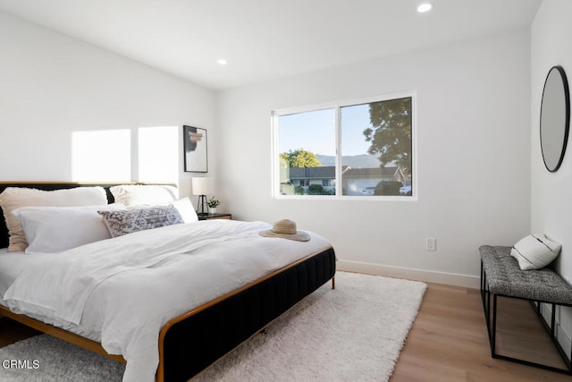 bedroom featuring light hardwood / wood-style floors