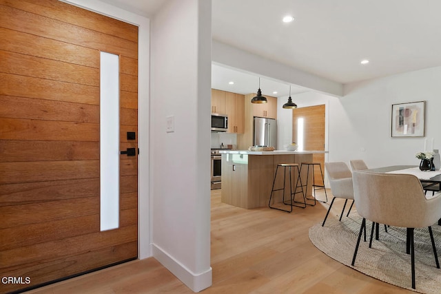 foyer featuring light wood-type flooring