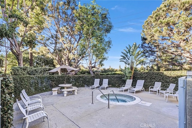 view of patio / terrace with a community hot tub