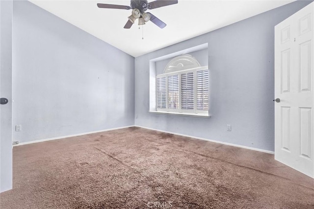 carpeted empty room featuring ceiling fan