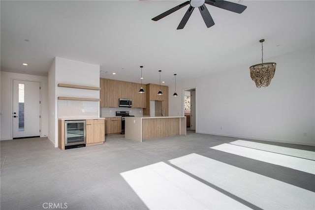 living room featuring wine cooler and ceiling fan