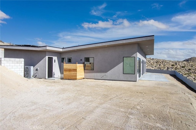 back of house with a patio area