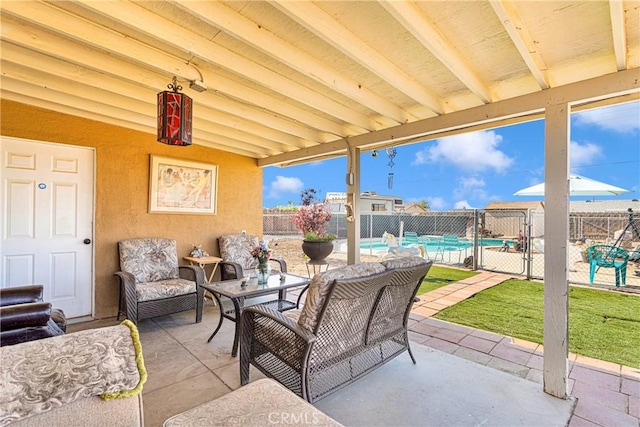 view of patio featuring a fenced in pool