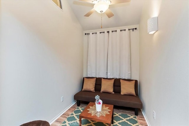 sitting room featuring ceiling fan, vaulted ceiling, and hardwood / wood-style flooring