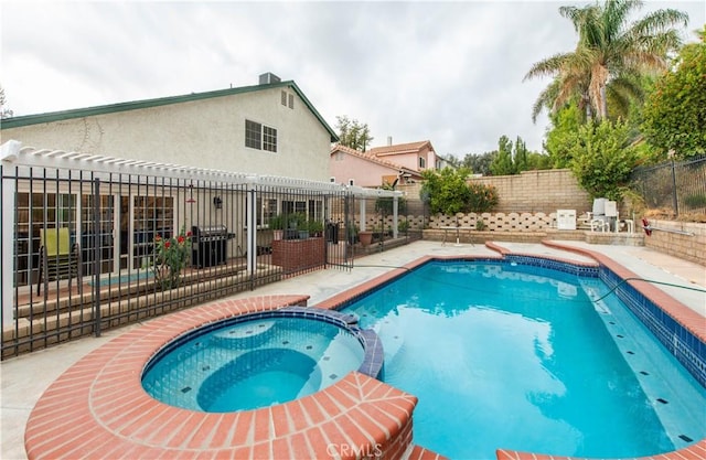 view of pool featuring an in ground hot tub, a pergola, and a patio