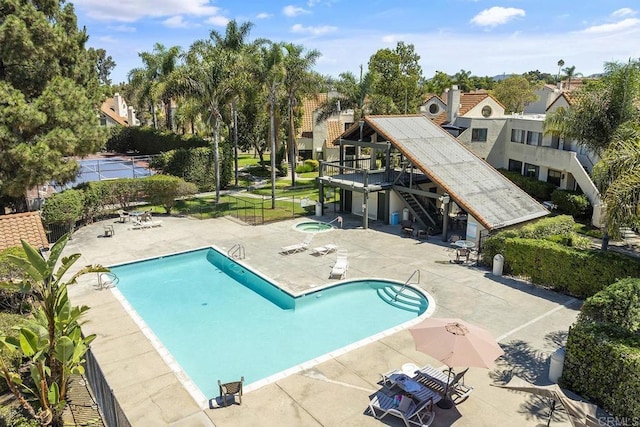 view of pool featuring a patio