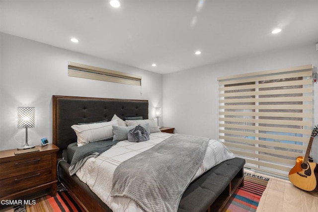 bedroom featuring wood-type flooring