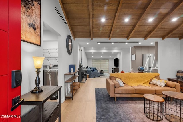 living room featuring lofted ceiling with beams, wood ceiling, and light hardwood / wood-style flooring