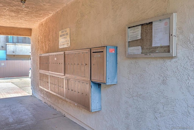 exterior space featuring a mail area