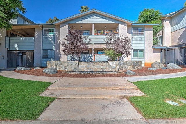 view of front of home with a front yard