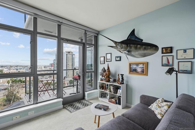 carpeted living room featuring floor to ceiling windows and a wealth of natural light